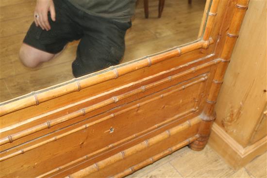 A faux bamboo mirrored cabinet with shelves W.100cm approx.